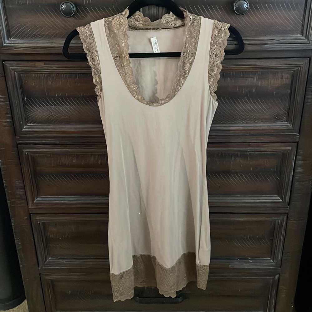 Used women’s Free People dress. Color taupe.